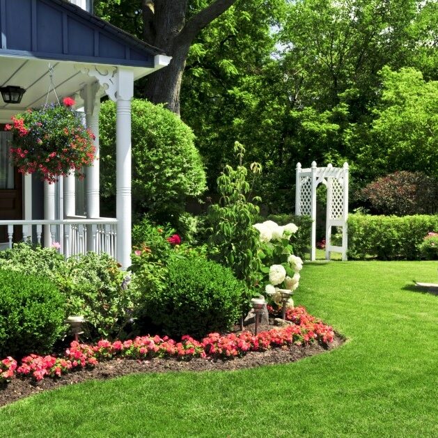 Professional landscaper providing high-quality lawn care services for homeowners.